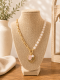 Asymmetrical gold paperclip chain necklace with soft blush gemstone bead detailing