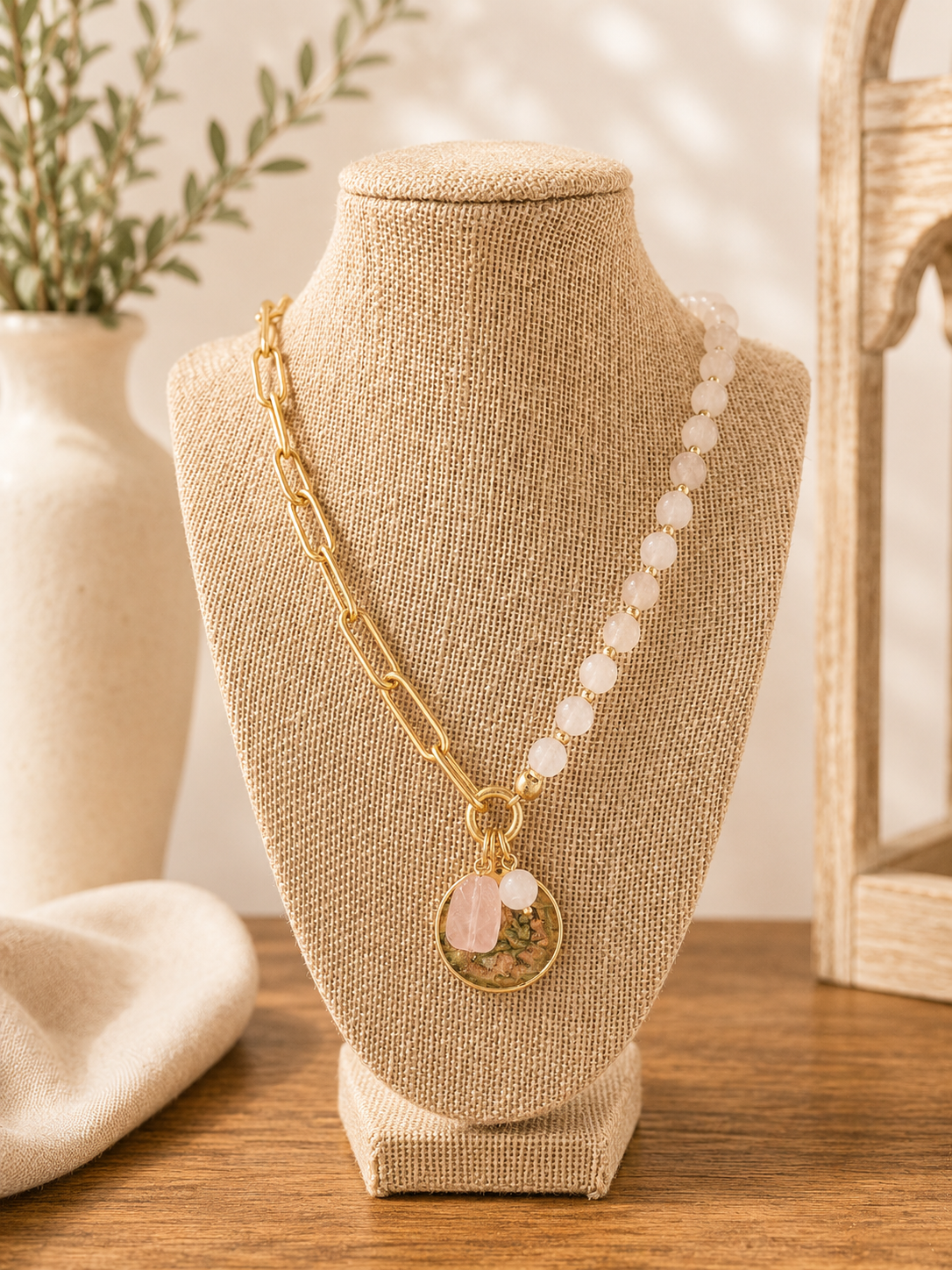 Asymmetrical gold paperclip chain necklace with soft blush gemstone bead detailing