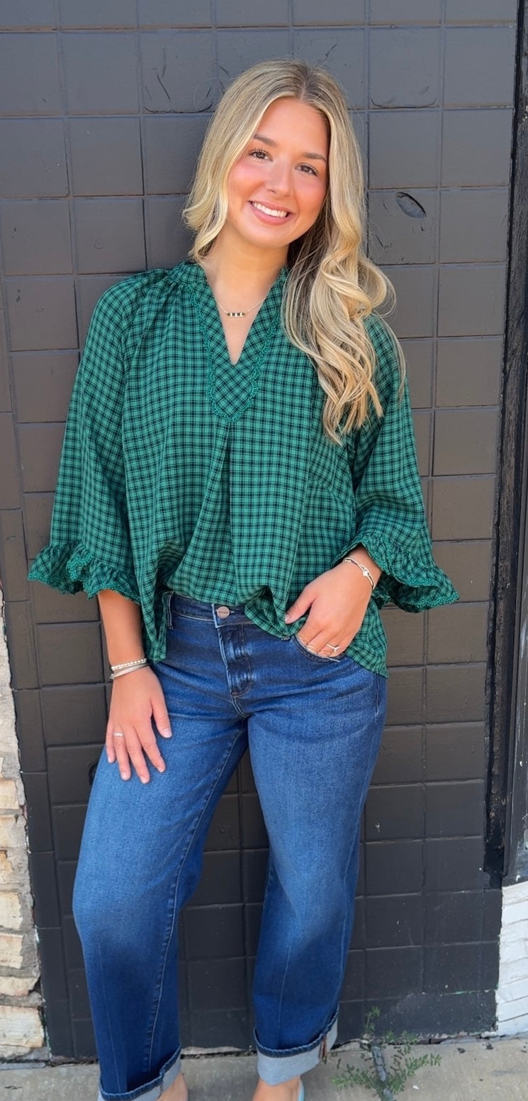 Navy and green ruffle sleeve shirt